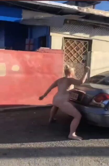 African Woman With Big Breasts Strips Naked And Runs Mad In Public