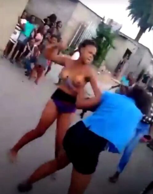 Breasts pop out as 2 street girls fight over a boyfriend in public