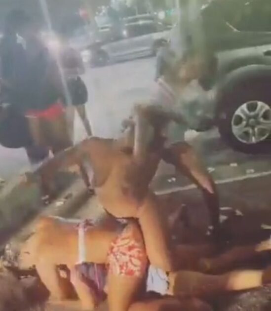 Breasts pop out as 2 street girls fight over a boyfriend in public