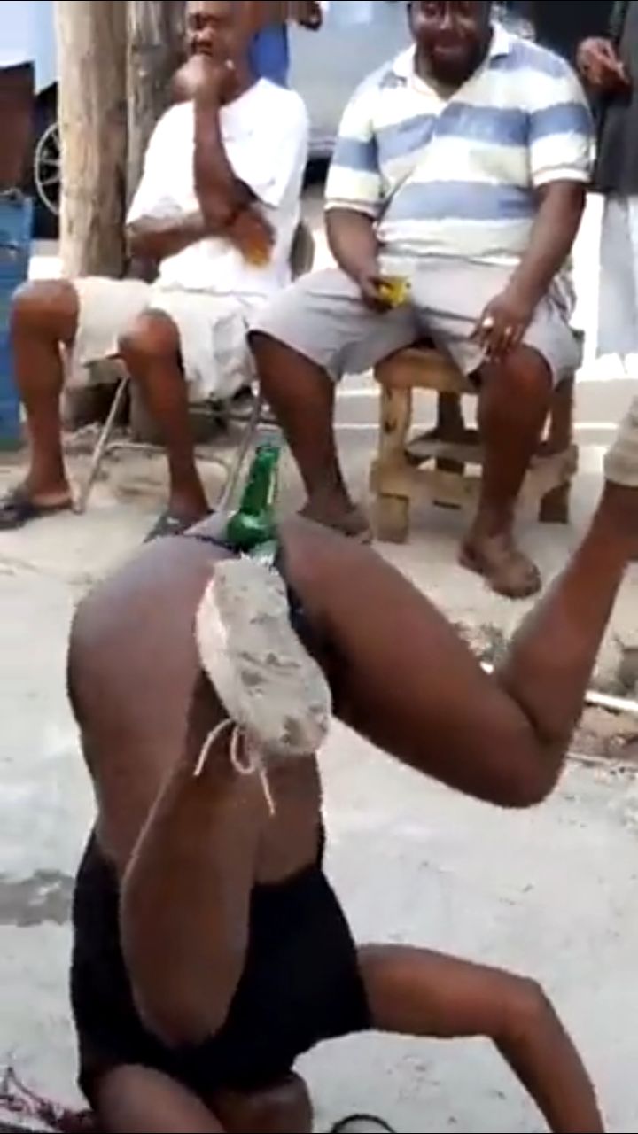 Girl Fucking Her Pussy With A Bottle To Entertain A Crowd In Public (18+)
