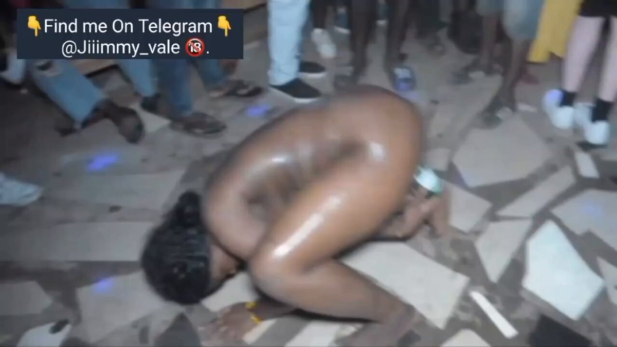 A woman in a short dress dancing on a stage