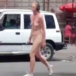 1972848398991790401__1759715834190_Crazy white woman walks n